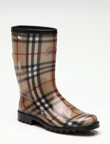 Traditional signature check and prorsum horse-printed fabric are covered in clear rubber for waterproof protection.Rubber heel, 1 (25mm) Shaft, 9¼ Leg circumference, 14 Round toe Leather trim at top Pull-on style Padded insole Rubber lug sole Made in ItalyOUR FIT MODEL RECOMMENDS ordering true whole size; ½ sizes should order the next whole size down. 