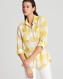 A vibrant lemony hue infuses this C&C California shirt, complete with chest patch pockets and button-tab sleeves, with sunny-season style.