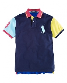 Bold pops of neon impart athletic appeal to a trim-fitting short-sleeved polo shirt in breathable cotton mesh. Bold pops of neon impart athletic appeal to a trim-fitting short-sleeved polo shirt in breathable cotton mesh.