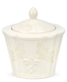 With embossed lilies and golden leaves, Portmeirion's decorated Fleur de Lys sugar bowl sets tables in the French tradition. Classic, scalloped stoneware in warm ivory lends distinct old-world elegance to everyday dining. With embossed lilies and golden leaves, Portmeirion's decorated Fleur de Lys sugar bowl sets tables in the French tradition. Classic, scalloped stoneware in warm ivory lends distinct old-world elegance to everyday dining.