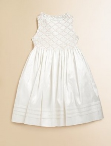 She'll feel like a princess in luxurious silk with a precious floral smocked bodice and full skirt.Jewel neckline with rufflesSleevelessBack buttonsBack ribbon-tie waistFull, pleated skirtPleated hemSilkDry cleanImported Please note: Number of buttons may vary depending on size ordered. She'll feel like a princess in luxurious silk with a precious floral smocked bodice and full skirt.Jewel neckline with rufflesSleevelessBack buttonsBack ribbon-tie waistFull, pleated skirtPleated hemSilkDry cleanImported Please note: Number of buttons may vary depending on size ordered.