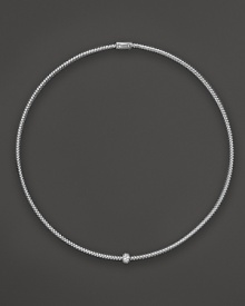 A single diamond station shines on this 18K white gold mesh necklace from Roberto Coin. A single diamond station shines on this 18K white gold mesh necklace from Roberto Coin.