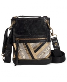 Stay organized and chic with a casual crossbody from The Sak. Silvertone accents and contrast stitching give this design both day and night-time appeal. Stay organized and chic with a casual crossbody from The Sak. Silvertone accents and contrast stitching give this design both day and night-time appeal.