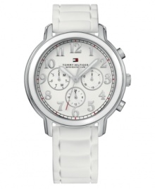 Classic styling and a fresh feminine white make this Tommy Hilfiger watch perfect for any occasion. White rubber strap. Silvertone stainless steel round case and round white dial with thee subdials, logo and numeral indices. Quartz movement. Water resistant to 50 meters. Ten-year limited warranty. Classic styling and a fresh feminine white make this Tommy Hilfiger watch perfect for any occasion. White rubber strap. Silvertone stainless steel round case and round white dial with thee subdials, logo and numeral indices. Quartz movement. Water resistant to 50 meters. Ten-year limited warranty.