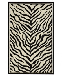 Nature-inspired designs lend beauty to the Utopia collection from Sphinx. Hand-tufted of fine wool, this lustrous rug's black and white zebra pattern is a gorgeous way to add sophisticated character to your home. With an ultrasoft hand for a blissful result.