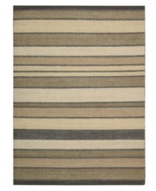 Variegated striping gives way to understated sophistication in the Horizon area rug from Calvin Klein. Generously thick wool fibers are hand tufted in India for remarkable strength and detailed design.