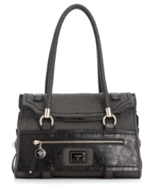 An uptown silhouette with downtown detailing, this satchel by GUESS is ideal for a true city girl. A cotton exterior is detailed with shiny leatherette for a sophisticated yet edgy vibe too chic to resist. An uptown silhouette with downtown detailing, this satchel by GUESS is ideal for a true city girl. A cotton exterior is detailed with shiny leatherette for a sophisticated yet edgy vibe too chic to resist.