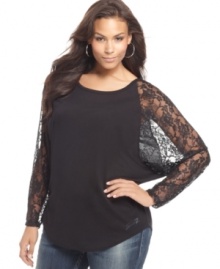 Sass up your look in Seven7 Jeans' plus size top, accented by lace sleeves.