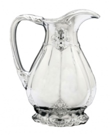 Hold court with the regal elegance of Fleur de Lis serveware and serving dishes. Lavish detail featuring the iconic French lily evokes another era, gleaming spectacularly in this magnificent pitcher from Arthur Court. Hold court with the regal elegance of Fleur de Lis serveware and serving dishes. Lavish detail featuring the iconic French lily evokes another era, gleaming spectacularly in this magnificent pitcher from Arthur Court.