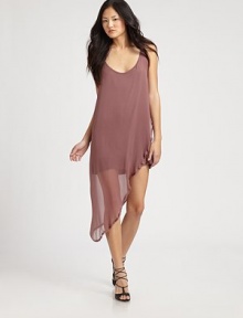 Semi-sheer silk chiffon overlay with a dramatic asymmetrical hem rests upon a reversible mini. ScoopneckSleevelessAsymmetrical hemReversible tank dress includedSilkDry cleanImported of American fabricModel shown is 5'10 (177cm) wearing US size Small. Semi-sheer silk chiffon overlay with a dramatic asymmetrical hem rests upon a reversible mini. ScoopneckSleevelessAsymmetrical hemReversible tank dress includedSilkDry cleanImported of American fabricModel shown is 5'10 (177cm) wearing US size Small.