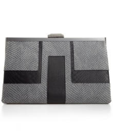 Slim and structured, this bold beauty from RAHCEL Rachel Roy is designed for dalliances after hours. Adorned with signature detailing and colorblock deco design, it's sized-right for evening essentials. Slim and structured, this bold beauty from RAHCEL Rachel Roy is designed for dalliances after hours. Adorned with signature detailing and colorblock deco design, it's sized-right for evening essentials.