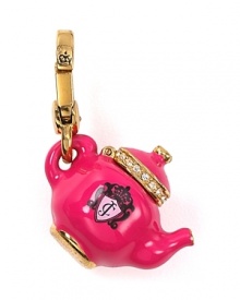 Oh so charming. This Juicy Couture token is designed to fit your personal style to a tea.