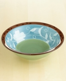 Every meal feels like a fresh spring picnic with this Patio Garden serve bowl. The pale silhouettes of blooming flowers dance against brushed earth tones to rejuvenate your table year-round. A dark vine adds an element of classic pottery design to this contemporary botanical motif. From Pfaltzgraff's collection of dinnerware and dishes. Every meal feels like a fresh spring picnic with this Patio Garden serve bowl. The pale silhouettes of blooming flowers dance against brushed earth tones to rejuvenate your table year-round. A dark vine adds an element of classic pottery design to this contemporary botanical motif. From Pfaltzgraff's collection of dinnerware and dishes.