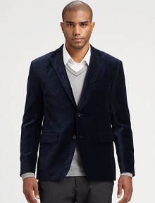 A soft velvet sportcoat exudes a quiet elegance, while a structured silhouette adds a timeless, tailored finish to every smart, well-assembled look.Button-frontChest welt, waist flap pocketsSide ventsFully linedCottonMachine washImported