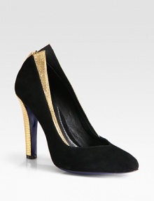 Supported by an embossed metallic leather heel, this stunning suede silhouette has a low-cut front and embossed metallic leather trim. Embossed metallic leather heel, 4 (100mm)Suede and embossed metallic leather upperLeather lining and solePadded insoleImportedOUR FIT MODEL RECOMMENDS ordering true size. 