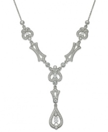 A vintage-inspired necklace that exudes charm, by Eliot Danori. The Splendor Y necklace boasts shimmering crystals and cubic zirconias (1/4 ct. t.w.). Crafted in rhodium-plated mixed metal. Approximate length: 16 inches + 2-inch extender. Approximate drop: 1-1/4 inches. A vintage-inspired necklace that exudes charm, by Eliot Danori. The Splendor Y necklace boasts shimmering crystals and cubic zirconias (1/4 ct. t.w.). Crafted in rhodium-plated mixed metal. Approximate length: 16 inches + 2-inch extender. Approximate drop: 1-1/4 inches.