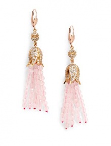 THE LOOKFeminine Metals collectionRhinestone ball and flower detailPink opal-colored tassel accent14k goldplated settingLatch back closureTHE MEASUREMENTLength, about 3ORIGINImported