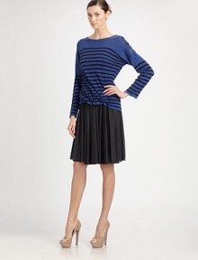 Sporty horizontal stripes band the body of this soft cotton silhouette.Jewel necklineDropped shoulder with button closuresLong sleeves Signature back loopCottonDry cleanMade in ItalyModel size is 5'11 (180cm) wearing US size Small. 