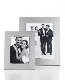 Allover texture gives Leeber's aluminum picture frame a look of modern polish and sophistication. Ideal for any room, setting and photo. Allover texture gives Leeber's aluminum picture frame a look of modern polish and sophistication. Ideal for any room, setting and photo.