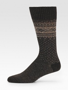 A timeless Nordic pattern is woven with the luxurious touch of merino wool. Ribbed toplineMid-calf height80% merino wool/20% polyamideMachine washMade in Germany