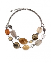 Animal prints have evolved into a year-round fashion staple, and Style&co.'s two-row beaded necklace is no exception. The leopard pattern and subdued brown tones make it a chic choice for any season. Made in  mixed metal. Approximate length: 18 inches + 3-inch extender. Approximate drop: 4-1/2 inches.