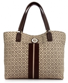 A timeless silhouette gets a preppy makeover with this take-anywhere tote from Tommy Hilfiger. Signature jacquard is outfitted with custom golden hardware and contrast striping, while the generous interior carries all your essentials from work to weekend. A timeless silhouette gets a preppy makeover with this take-anywhere tote from Tommy Hilfiger. Signature jacquard is outfitted with custom golden hardware and contrast striping, while the generous interior carries all your essentials from work to weekend.