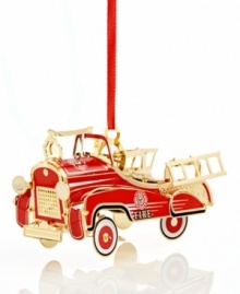 Steer this blazing red fire truck into your tree. Handcrafted in solid brass with gold rims and ladders, it's an authentic replica of the classic vehicle. From Baldwin. Steer this blazing red fire truck into your tree. Handcrafted in solid brass with gold rims and ladders, it's an authentic replica of the classic vehicle. From Baldwin.