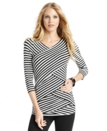 Think outside the lines: Vince Camuto outfits this top with crisscrossing panels of stripes for a striking bandage-style look.