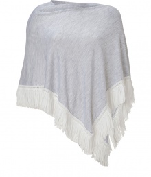 A luxe alternative to the classic sweater, Antonia Zanders fringed poncho is a unique modern choice - Boat neckline, triangle hemline with white fringe - Asymmetrical drape - Wear with tailored trousers and sleek leather accessories