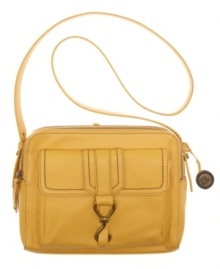 Luxe leather graces this sophisticated design from The Sak. Accented with antique brass-tone hardware and a signature charm, this refined style exudes effortless chic. Luxe leather graces this sophisticated design from The Sak. Accented with antique brass-tone hardware and a signature charm, this refined style exudes effortless chic.