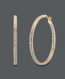 Stand out in a crowd. These large hoop earrings by Victoria Townsend are not for the shy. Crafted in 18k gold over sterling silver, these earrings sparkle with the addition of round-cut diamond accents. Approximate diameter: 1-5/8 inches.