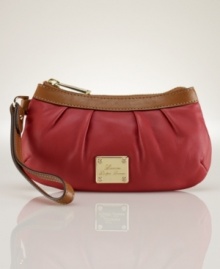 Rock the boat: the contoured silhouette and wavy pleats on this chic wristlet from Lauren by Ralph Lauren keep you ahead of the curve this season. Rock the boat: the contoured silhouette and wavy pleats on this chic wristlet from Lauren by Ralph Lauren keep you ahead of the curve this season.
