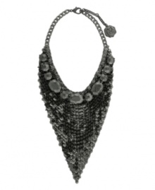 Dramatic and dazzling. Get noticed on your next night out with Vince Camuto's bold bib necklace. Crafted in hematite tone mixed metal, it's embellished with a glittering array of plastic beads woven into an intricate mesh design. Approximate length: 16 inches. Approximate drop: 6-1/2 inches.