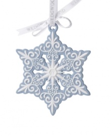 A symbol of the season! White bas-relief detail contrasts robin's-egg blue jasper in a snowflake ornament that stands out amid the rest of winter's beauty. From Wedgwood. A symbol of the season! White bas-relief detail contrasts robin's-egg blue jasper in a snowflake ornament that stands out amid the rest of winter's beauty. From Wedgwood.