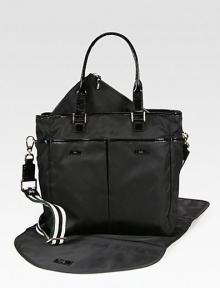 A roomy top-handle carryall, perfectly sized for all your essentials.Double top handles, 8 dropDetachable shoulder strap, 15½-25 dropOpen topFive outside open pocketsProtective metal feetOne removable changing matOne removable zip pouchOne pen holderOne inside zip pocketOne inside open pocketCotton lining12½W X 12¾H X 5½DImported A roomy top-handle carryall, perfectly sized for all your essentials.Double top handles, 8 dropDetachable shoulder strap, 15½-25 dropOpen topFive outside open pocketsProtective metal feetOne removable changing matOne removable zip pouchOne pen holderOne inside zip pocketOne inside open pocketCotton lining12½W X 12¾H X 5½DImported
