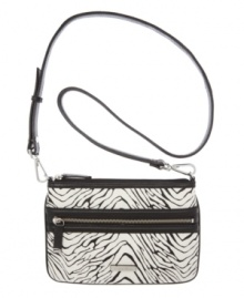 Twice as nice. The nylon crossbody purse by Calvin Klein transforms into a sleek modern clutch. Twice as nice. The nylon crossbody purse by Calvin Klein transforms into a sleek modern clutch.