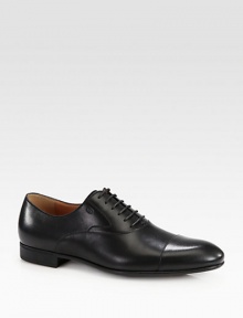 Black leather with embossed interlocking G detail.Rubber soleMade in Italy