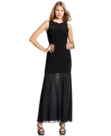 Sheer details make this Xscape gown striking: A mesh stripe at the chest and a flowing mermaid hem are alluring touches to this dress. Sheer details make this Xscape gown striking: A mesh stripe at the chest and a flowing mermaid hem are alluring touches to this dress.
