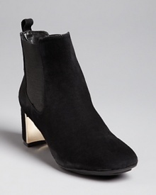With a hint of '60s Brit style, these Isaac Mizrahi New York booties are a stylish, neutral base for your entire wardrobe. With a hint of '60s Brit style, these Isaac Mizrahi New York booties are a stylish, neutral base for your entire wardrobe.
