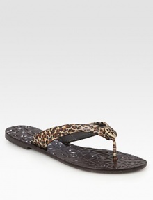 Saffiano leather thong in an exotic leopard print, topped with a goldtone designer adornment. Saffiano leather upperLeather liningRubber soleImportedOUR FIT MODEL RECOMMENDS ordering true whole size; ½ sizes should order the next whole size down. Saffiano leather thong in an exotic leopard print, topped with a goldtone designer adornment. Saffiano leather upperLeather liningRubber soleImportedOUR FIT MODEL RECOMMENDS ordering true whole size; ½ sizes should order the next whole size down.