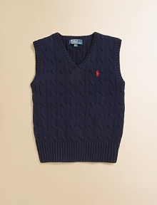 The essential sweater vest is a handsome layer rendered in durable cable-knit cotton.Ribbed V-neckSleevelessPullover styleRibbed hemCottonMachine washImported