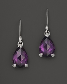 Pear-shaped purple crystal is set in sterling silver on these classic Judith Ripka earrings.