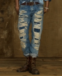 A slim-fitting jean is heavily ripped and patched for a shredded, well-worn look that pairs well with your favorite hoodie or V-neck tee. A slim-fitting jean is heavily ripped and patched for a shredded, well-worn look that pairs well with your favorite hoodie or V-neck tee.