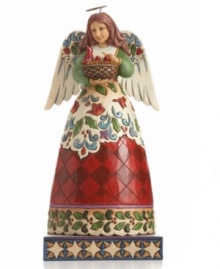 Hark! This gentle angel sets a joyful tone in holiday homes. Baby cardinals chirping in her basket and carved in her skirt celebrate the beauty of nature. With brilliant holly detail, red check and swirling winter wind. From Jim Shore. Hark! This gentle angel sets a joyful tone in holiday homes. Baby cardinals chirping in her basket and carved in her skirt celebrate the beauty of nature. With brilliant holly detail, red check and swirling winter wind. From Jim Shore.