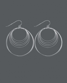 Get style that's out of this orbit! Chic, circular earrings by Unwritten feature a wire wrap design crafted in sterling silver. Approximate drop: 2-1/4 inches. Get style that's out of this orbit! Chic, circular earrings by Unwritten feature a wire wrap design crafted in sterling silver. Approximate drop: 2-1/4 inches.
