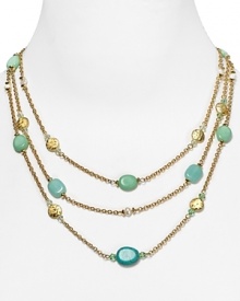 Embellished with striking turquoise beads and hammered stations, Lauren Ralph Lauren's link necklace is a striking adornment. Layer it over a crisp collar for a cool contrast. Embellished with striking turquoise beads and hammered stations, Lauren Ralph Lauren's link necklace is a striking adornment. Layer it over a crisp collar for a cool contrast.