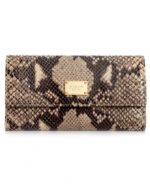 Check it. Sleek python-embossed leather is decked out in luxe 18K gold hardware for a jet set look that speaks for itself. Interior features separate checkbook and ID holder, plenty of billfold and card slots, and even a place for your favorite pen. Check it. Sleek python-embossed leather is decked out in luxe 18K gold hardware for a jet set look that speaks for itself. Interior features separate checkbook and ID holder, plenty of billfold and card slots, and even a place for your favorite pen.