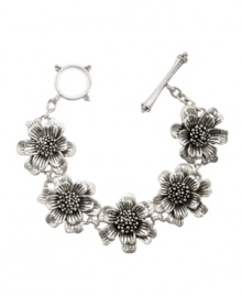 Channel your best flower child style with this pretty bracelet by Lucky Brand. Boasting an intricate Thai flower design, bracelet crafted in silver tone mixed metal with toggle closure. Approximate length: 7-5/8 inches.