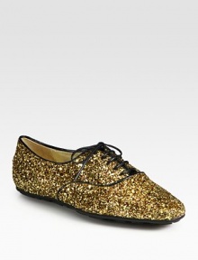 Add a dose of glitz to your ensemble with this glitter-covered leather design, finished with goldtone logo detail at the heel. Glitter-coated leather upperLeather liningRubber solePadded insoleMade in ItalyOUR FIT MODE Add a dose of glitz to your ensemble with this glitter-covered leather design, finished with goldtone logo detail at the heel. Glitter-coated leather upperLeather liningRubber solePadded insoleMade in ItalyOUR FIT MODE