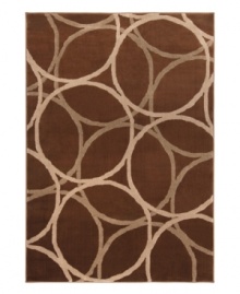 Interlacing circles in tonal shades of brown present a modern, captivating design in this Tribecca rug. The streamlined, low pile construction makes this rug both stylish and durable. (Clearance) Interlacing circles in tonal shades of brown present a modern, captivating design in this Tribecca rug. The streamlined, low pile construction makes this rug both stylish and durable. (Clearance)